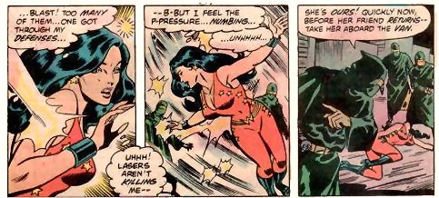 As Wonder Girl turns to see more attackers they continue firing and weakened, she is unable to stop the blasts. She crumples to the floor and they move in on her.